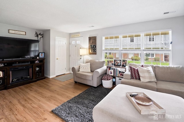 938 Thomas Ave, North Brunswick, NJ 08902 - living area featuring wood finished floors and baseboards