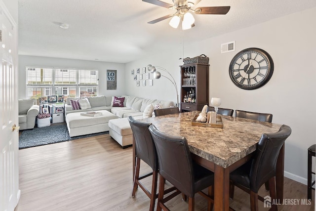 938 Thomas Ave, North Brunswick, NJ 08902 - dining room featuring light wood finished floors and a ceiling fan