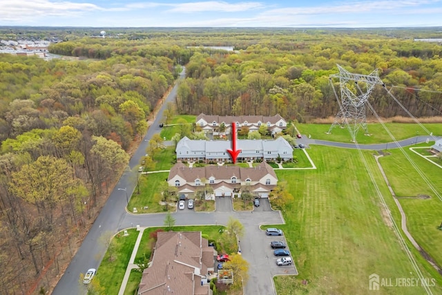 938 Thomas Ave, North Brunswick, NJ 08902 - aerial view of property and surrounding area with a heavily wooded area