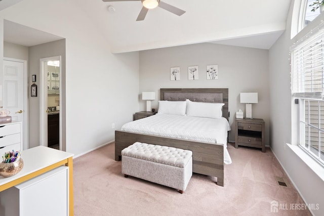 938 Thomas Ave, North Brunswick, NJ 08902 - bedroom with light carpet, lofted ceiling, multiple windows, and baseboards