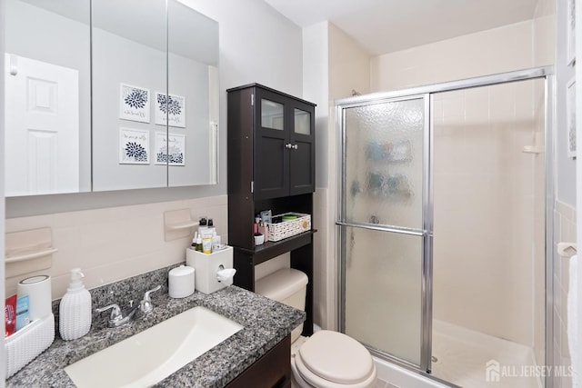 938 Thomas Ave, North Brunswick, NJ 08902 - bathroom with a shower stall, toilet, and vanity
