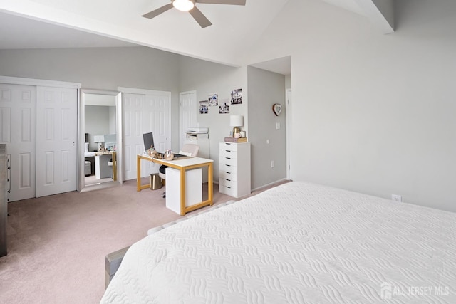 938 Thomas Ave, North Brunswick, NJ 08902 - bedroom with vaulted ceiling, light carpet, multiple closets, a desk, and a ceiling fan