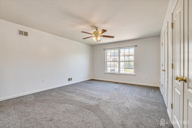 230 S 10th Ave S, Highland Park, NJ 08904 - spare room with a ceiling fan, dark carpet, and baseboards