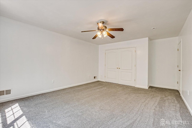230 S 10th Ave S, Highland Park, NJ 08904 - unfurnished bedroom featuring carpet flooring, baseboards, a ceiling fan, and a closet