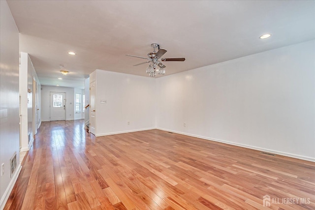 230 S 10th Ave S, Highland Park, NJ 08904 - spare room featuring a ceiling fan, light wood-style flooring, recessed lighting, baseboards, and stairs