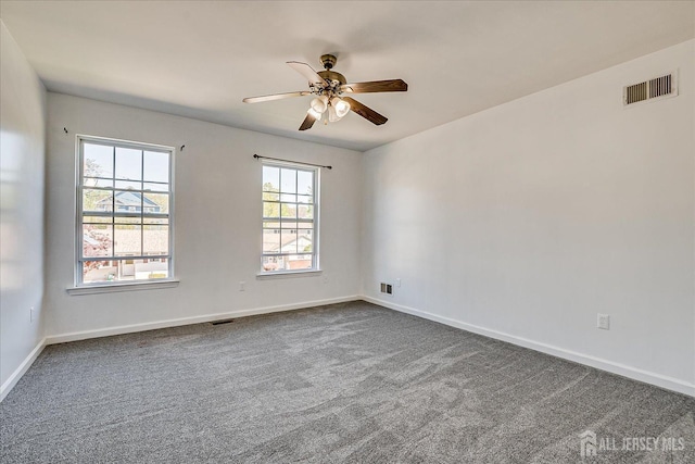 230 S 10th Ave S, Highland Park, NJ 08904 - empty room with ceiling fan, dark colored carpet, and baseboards