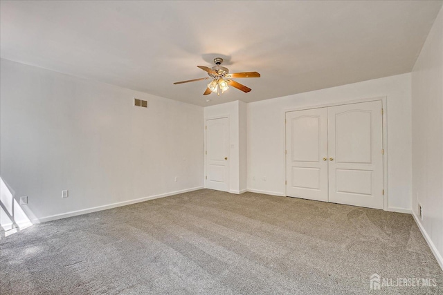 230 S 10th Ave S, Highland Park, NJ 08904 - unfurnished bedroom with carpet floors, baseboards, ceiling fan, and a closet