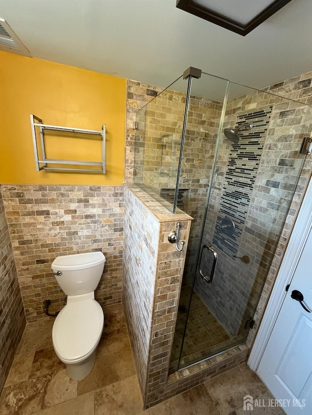 860 Barry Ave, Perth Amboy, NJ 08861 - full bathroom with a shower stall, wainscoting, and stone finish flooring
