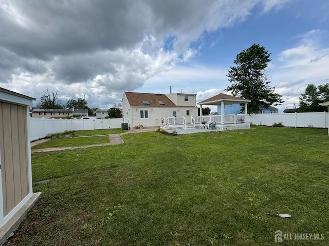 860 Barry Ave, Perth Amboy, NJ 08861 - rear view of property with a gazebo, a patio area, and a fenced backyard