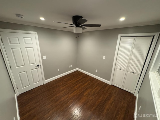 860 Barry Ave, Perth Amboy, NJ 08861 - unfurnished bedroom with crown molding, dark wood-style floors, recessed lighting, a ceiling fan, and a closet