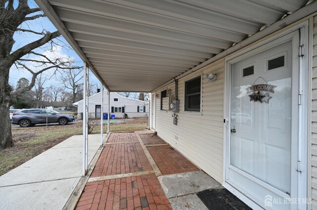 view of patio featuring a carport