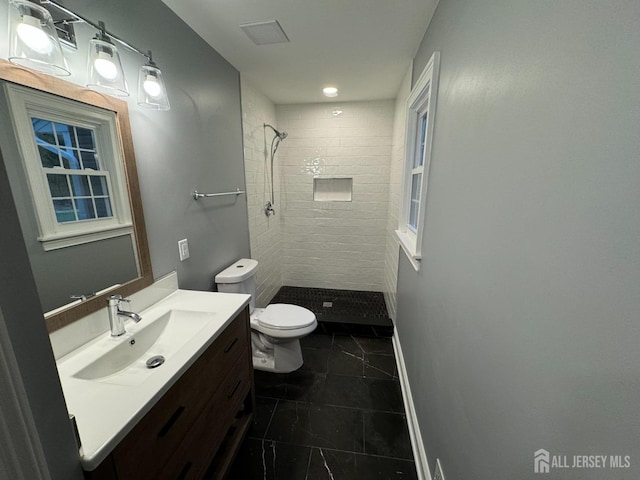 8 Woodlot Rd, East Brunswick, NJ 08816 - bathroom featuring toilet, vanity, a shower stall, tile patterned floors, and baseboards