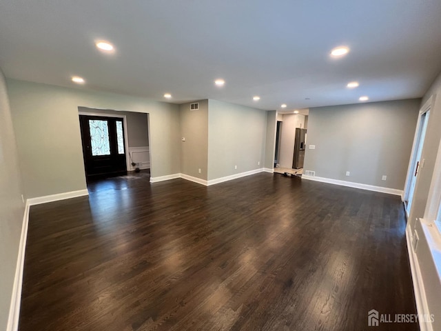 8 Woodlot Rd, East Brunswick, NJ 08816 - unfurnished room featuring recessed lighting, baseboards, and dark wood finished floors