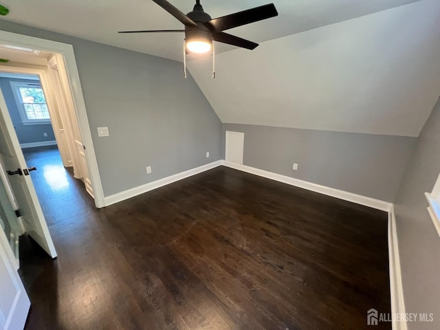 8 Woodlot Rd, East Brunswick, NJ 08816 - bonus room featuring a ceiling fan, dark wood finished floors, and lofted ceiling
