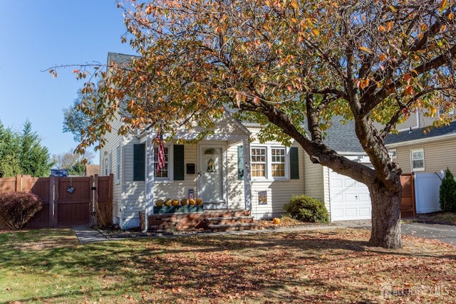 obstructed view of property featuring a garage