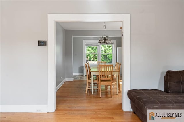 16 Lafayette Ave, Edison, NJ 08837 - dining room featuring light wood-style flooring, baseboards, and a chandelier