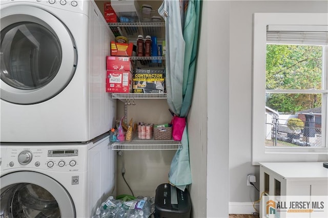 16 Lafayette Ave, Edison, NJ 08837 - laundry room featuring stacked washing machine and dryer