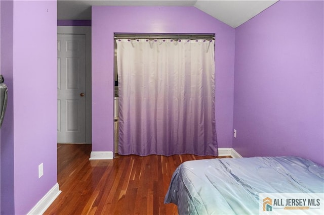 16 Lafayette Ave, Edison, NJ 08837 - bedroom featuring wood finished floors, baseboards, and lofted ceiling