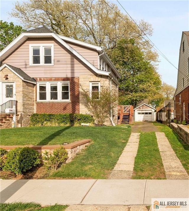 16 Lafayette Ave, Edison, NJ 08837 - bungalow-style home with concrete driveway, a garage, brick siding, and an outdoor structure