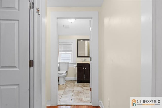 16 Lafayette Ave, Edison, NJ 08837 - half bath with toilet, baseboards, and vanity