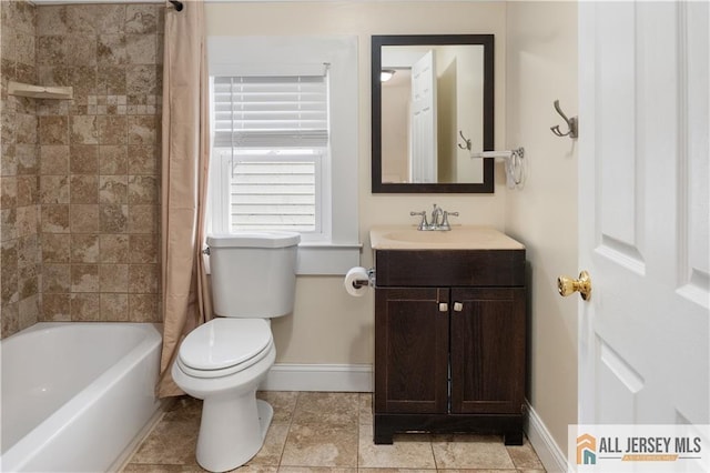 16 Lafayette Ave, Edison, NJ 08837 - bathroom with baseboards, toilet, vanity, and shower / bathtub combination with curtain