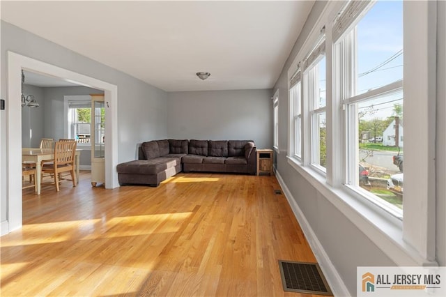 16 Lafayette Ave, Edison, NJ 08837 - living area with light wood finished floors and baseboards