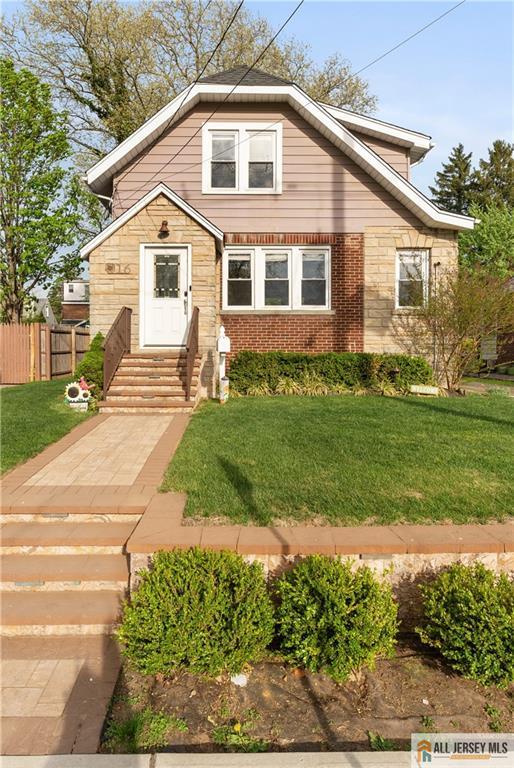 16 Lafayette Ave, Edison, NJ 08837 - bungalow-style house featuring entry steps, stone siding, and brick siding