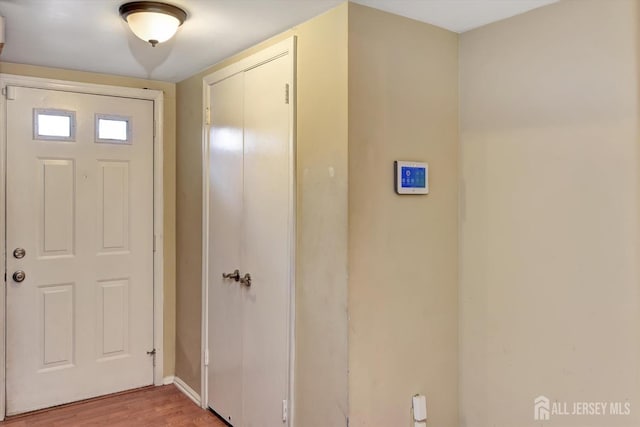 65 Brookview Cir, Jamesburg, NJ 08831 - foyer entrance with baseboards and light wood-type flooring