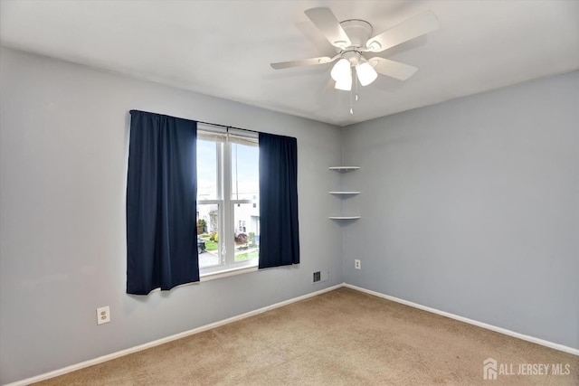 65 Brookview Cir, Jamesburg, NJ 08831 - unfurnished room featuring baseboards, a ceiling fan, and carpet