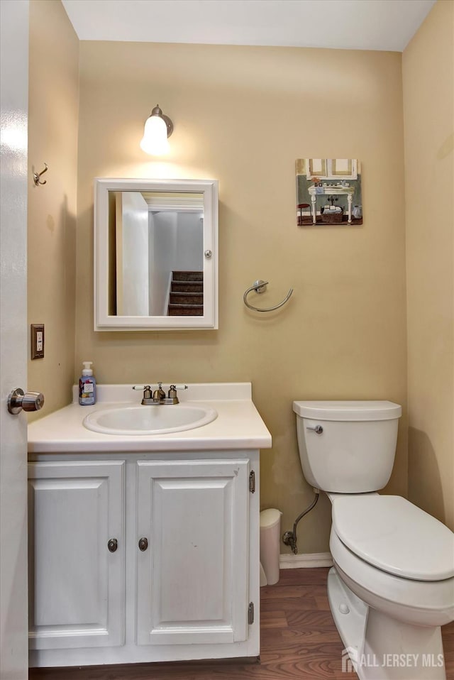 65 Brookview Cir, Jamesburg, NJ 08831 - bathroom featuring vanity, baseboards, toilet, and wood finished floors