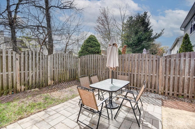 65 Brookview Cir, Jamesburg, NJ 08831 - view of patio with a fenced backyard and outdoor dining area