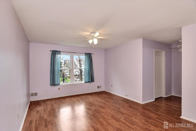 65 Brookview Cir, Jamesburg, NJ 08831 - spare room with visible vents, baseboards, ceiling fan, and wood finished floors