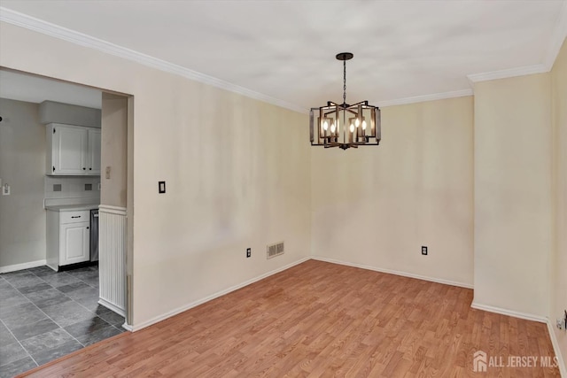 65 Brookview Cir, Jamesburg, NJ 08831 - spare room featuring an inviting chandelier, ornamental molding, and wood finished floors