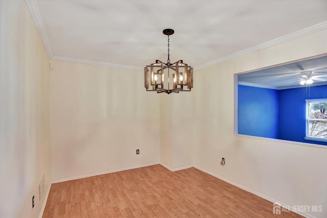 65 Brookview Cir, Jamesburg, NJ 08831 - unfurnished room featuring crown molding, ceiling fan with notable chandelier, baseboards, wood finished floors, and visible vents