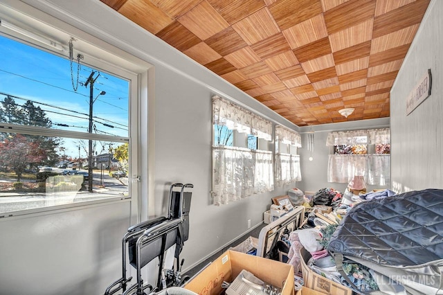 interior space featuring wooden ceiling and multiple windows