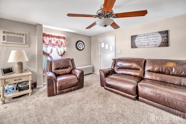 carpeted living room featuring ceiling fan, radiator, and a wall mounted AC