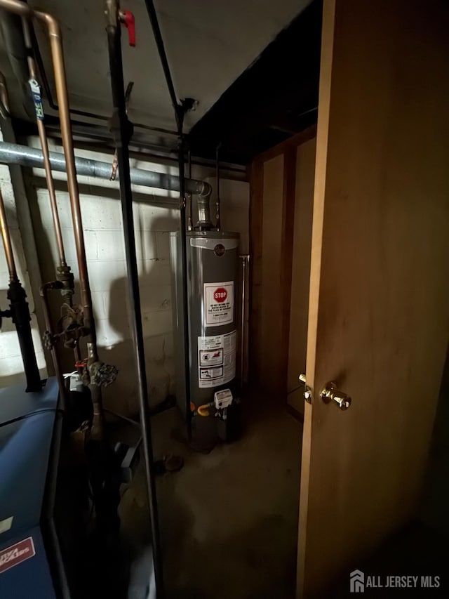 450 Brace Ave, Perth Amboy, NJ 08861 - utility room with water heater