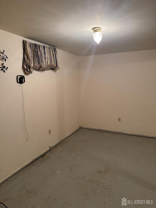 450 Brace Ave, Perth Amboy, NJ 08861 - unfurnished room with concrete floors