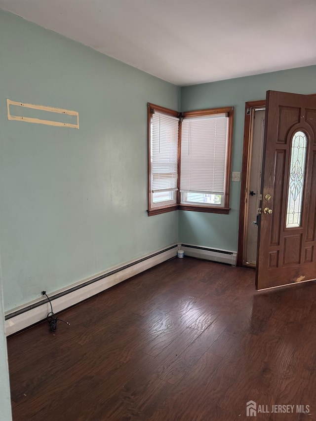 450 Brace Ave, Perth Amboy, NJ 08861 - entryway featuring dark wood-type flooring and baseboard heating
