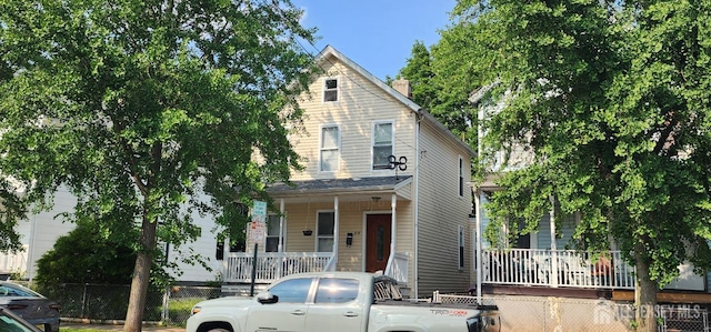 13 James St, New Brunswick, NJ 08901 - view of front of home with a porch