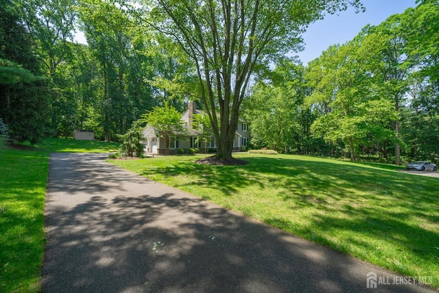 5 Wedgewood Ln, Holmdel, NJ 07733 - view of front facade featuring a front lawn