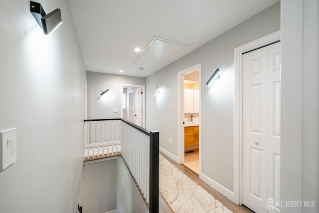 5 Wedgewood Ln, Holmdel, NJ 07733 - hall with attic access, an upstairs landing, wood finished floors, and recessed lighting