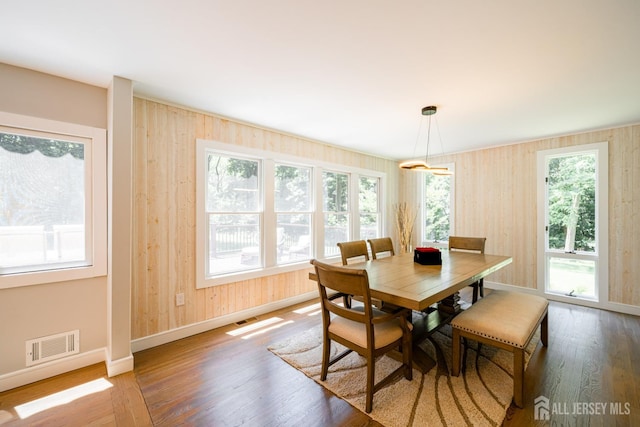 5 Wedgewood Ln, Holmdel, NJ 07733 - dining space featuring wood finished floors and wooden walls