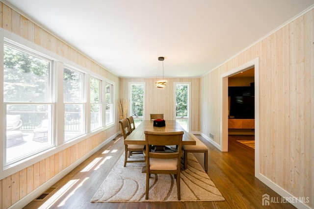 5 Wedgewood Ln, Holmdel, NJ 07733 - dining area with wood finished floors and wood walls