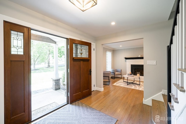 5 Wedgewood Ln, Holmdel, NJ 07733 - entryway featuring plenty of natural light, a fireplace, light wood-style floors, and recessed lighting