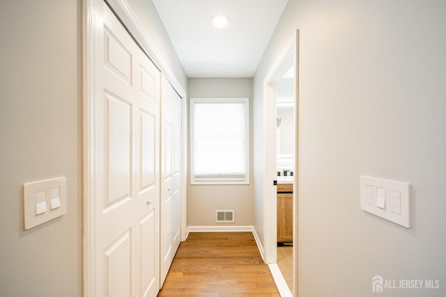 5 Wedgewood Ln, Holmdel, NJ 07733 - corridor with light wood-style floors and baseboards