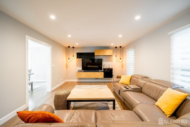 5 Wedgewood Ln, Holmdel, NJ 07733 - living area with light wood-type flooring, recessed lighting, and plenty of natural light