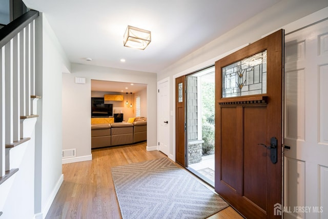 5 Wedgewood Ln, Holmdel, NJ 07733 - foyer entrance featuring stairs, light wood-style floors, and recessed lighting