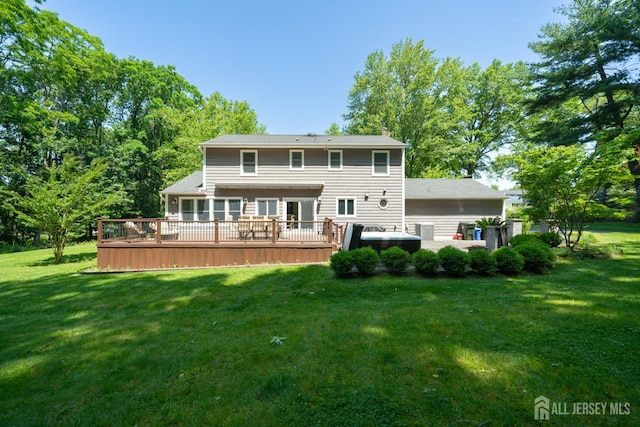 5 Wedgewood Ln, Holmdel, NJ 07733 - rear view of house featuring a wooden deck, a lawn, and a chimney