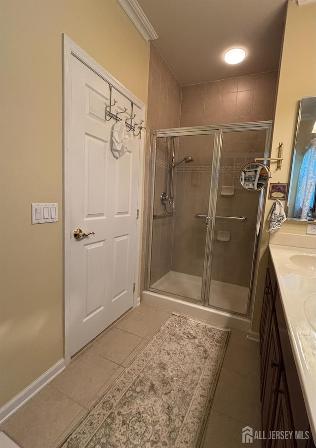 128 Fontaine Ct, Monroe, NJ 08831 - bathroom featuring tile patterned floors, a stall shower, and vanity